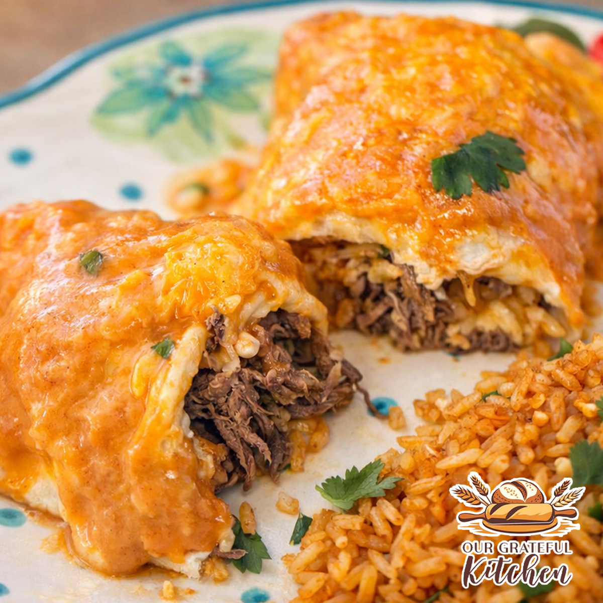 Creamy beef enchiladas with shredded beef filling served with homemade Spanish rice