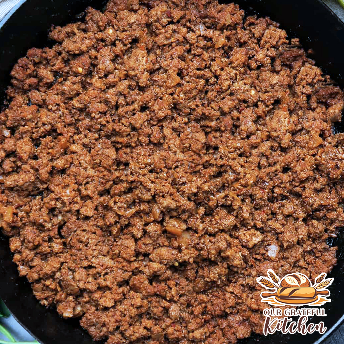 Easy taco meat made with seasoned ground beef in a cast iron skillet.