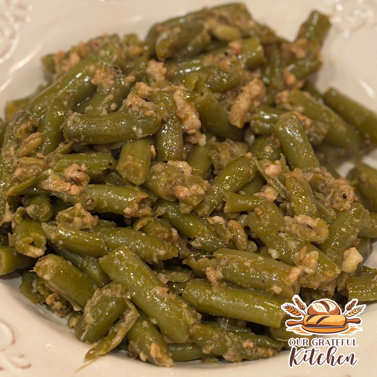 Garlic Parmesan green beans made with canned green beans in a white serving bowl